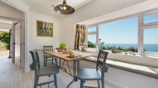 The sitting and dining area at Chesil Cottage, Dorset